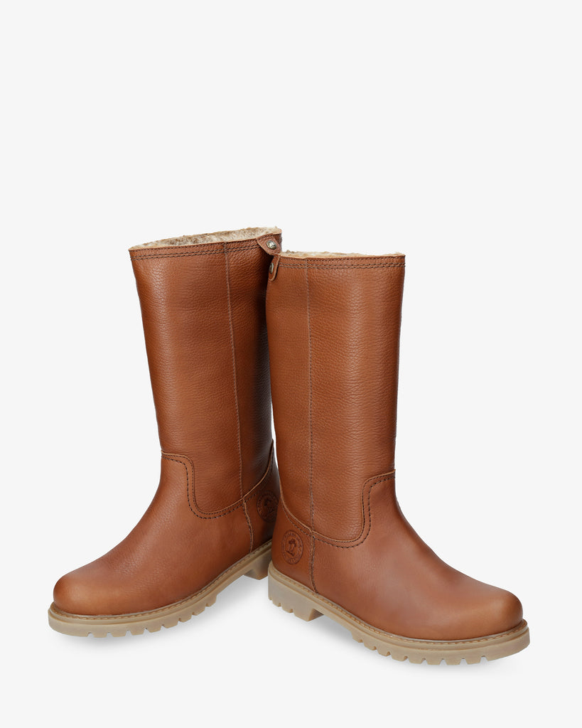 Bambina botas de piel con forro interior de pelo. cuero