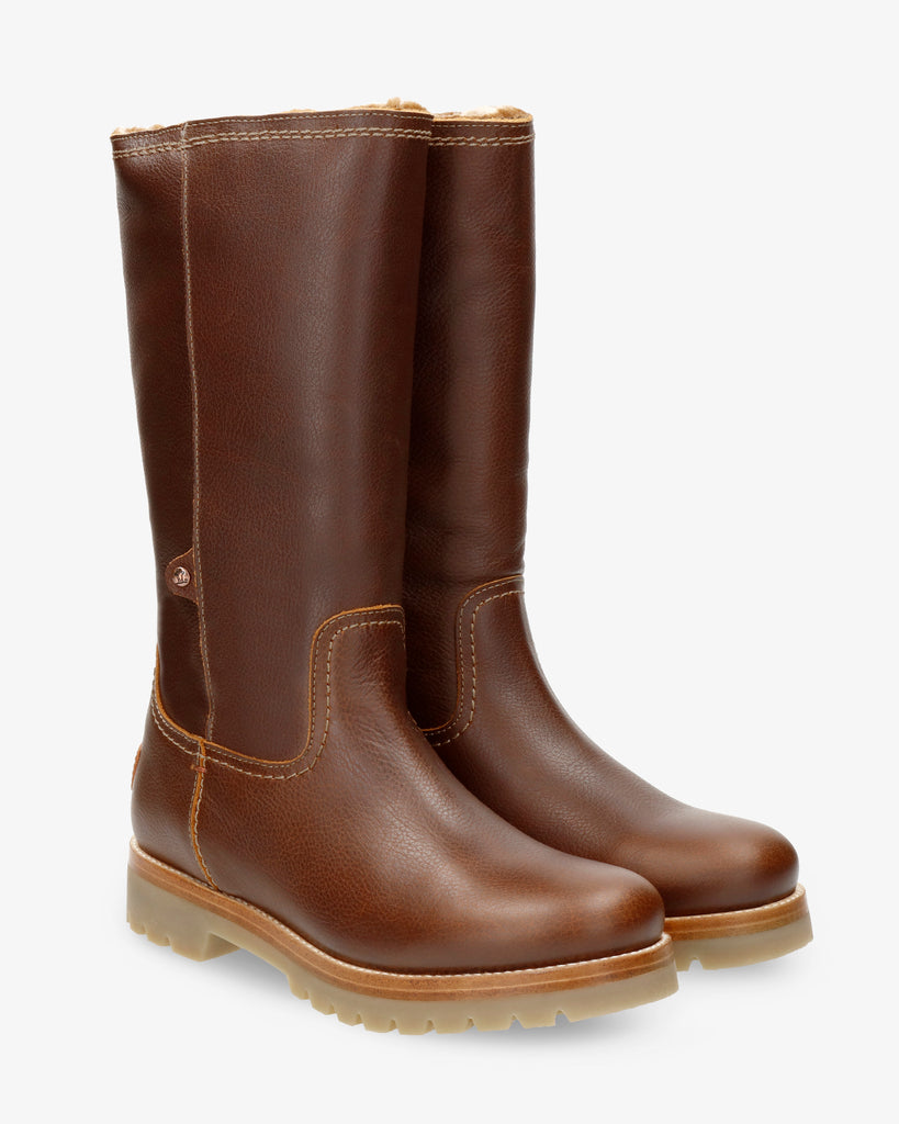 Bambina botas de piel con forro interior de pelo. cuero